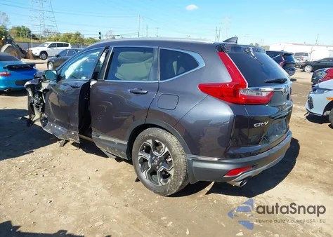 2019 Honda Cr-V Touring z USA, uszkodzony, nr VIN 2HKRW2H96KH652597